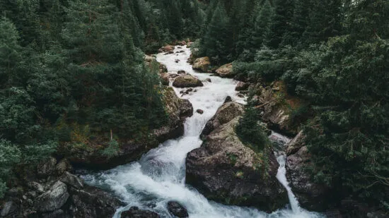Thornburg Investment Income Builder Fund, water rushes down rocks in a stream