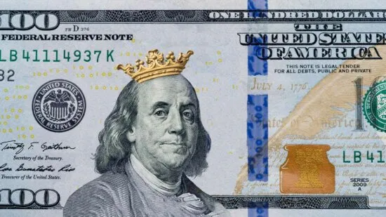 One hundred dollar bill with a crown on Ben Franklin's head.