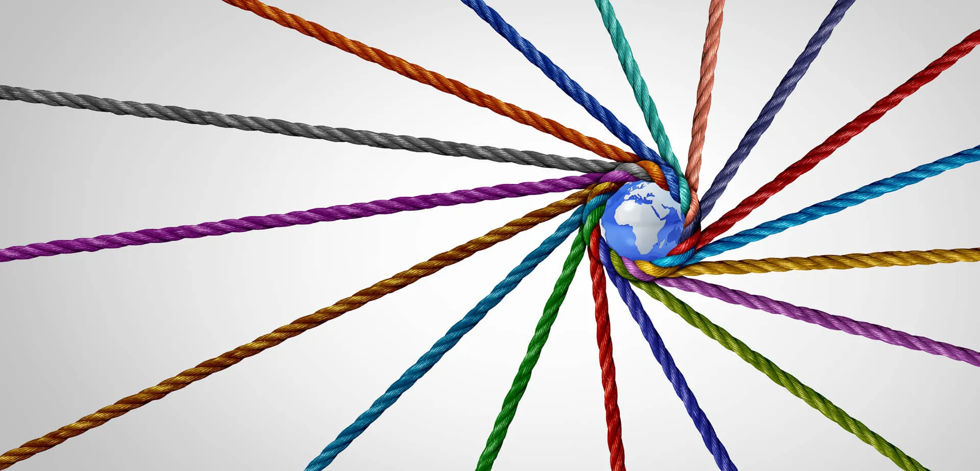 Globe wrapped with colorful cords