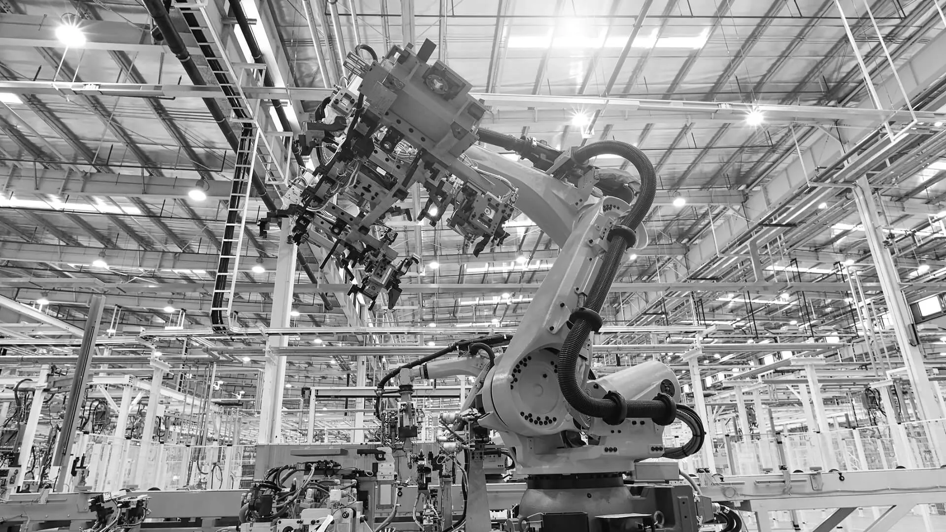 Automobile plant, Industrial machinery automatic arm welding cars robot in production line of vehicle manufacturer factory